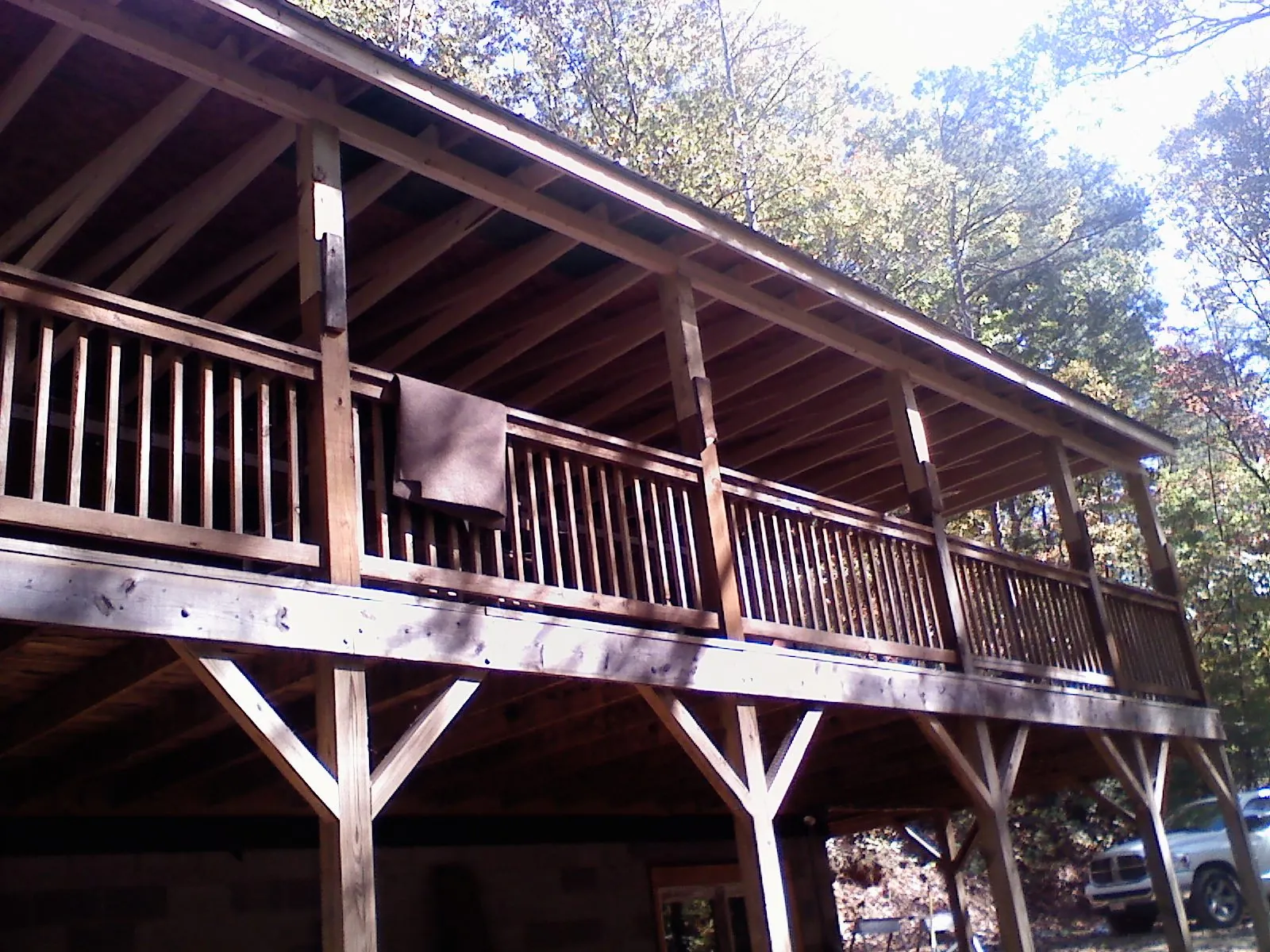 Timber framing under a new elevated porch and deck — Roof Leak Repair in Topsfield by Roofing Brothers